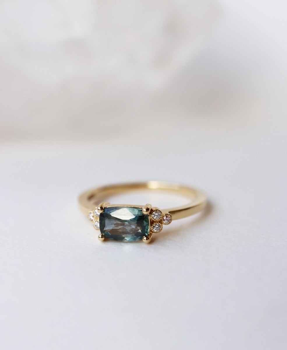 Mon Cheri Engagement Ring - 18k Yellow Gold, Emerald Cut Teal Sapphire 0.92 carat