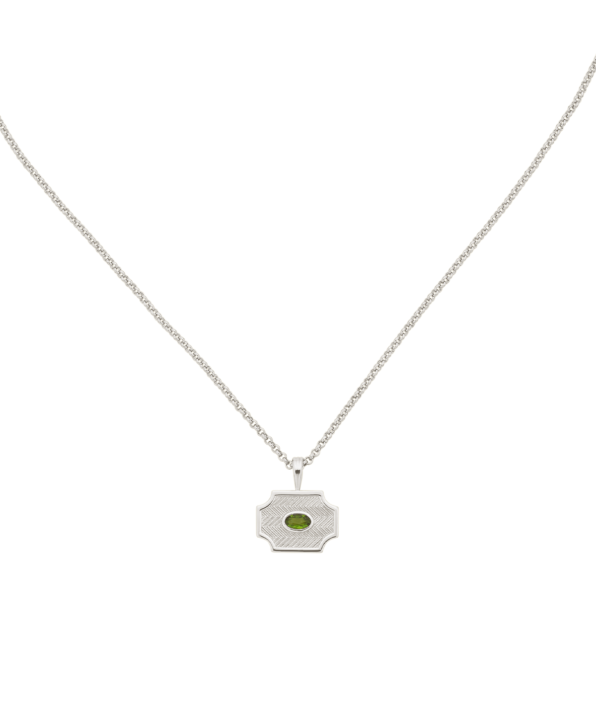 A clearcut of the Soul Sister Necklace, a silver textured pendant with a central green stone, suspended from a fine belcher chain.