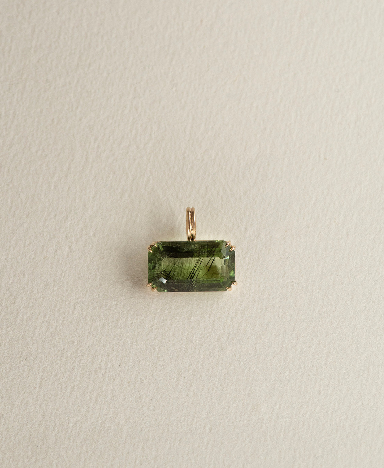 One of a Kind Charm 513 in 9k Yellow Gold featuring a  deep green emerald cut Peridot with a claw setting.