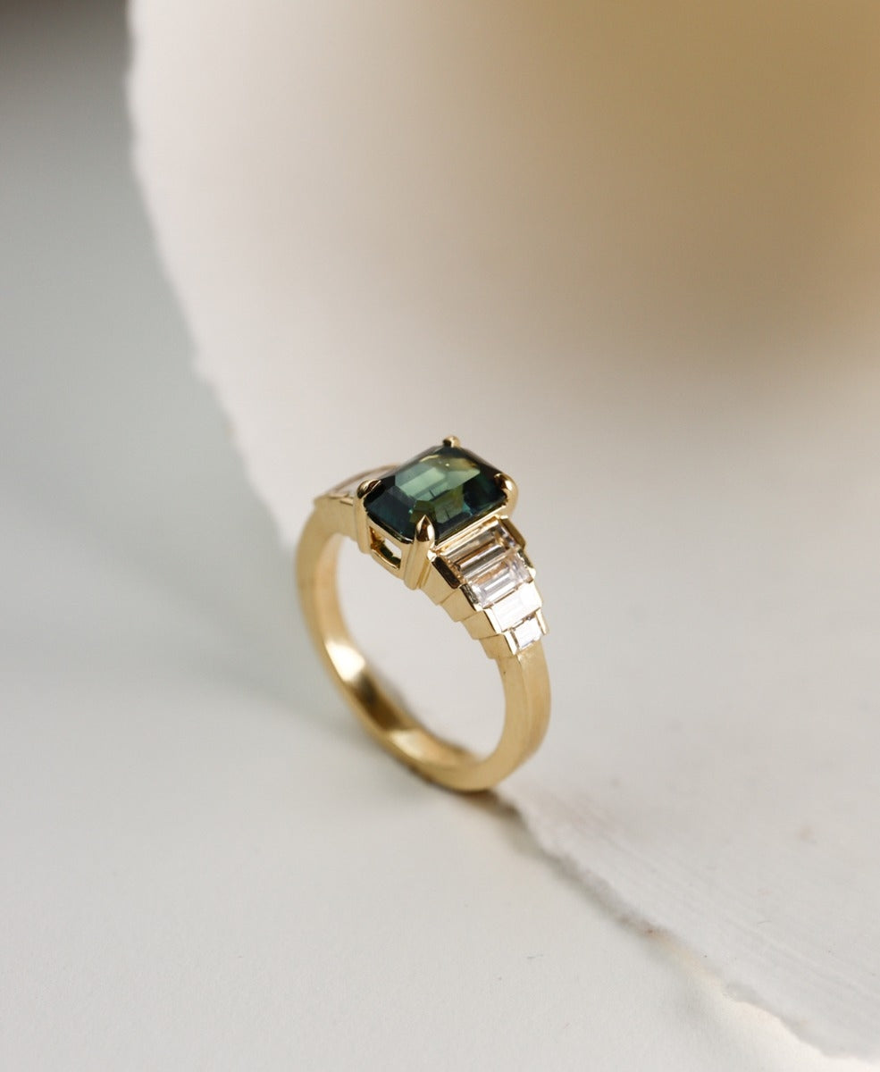 Fides Engagement Ring - 18k Yellow Gold, Emerald Cut Teal Sapphire 1.75 carat