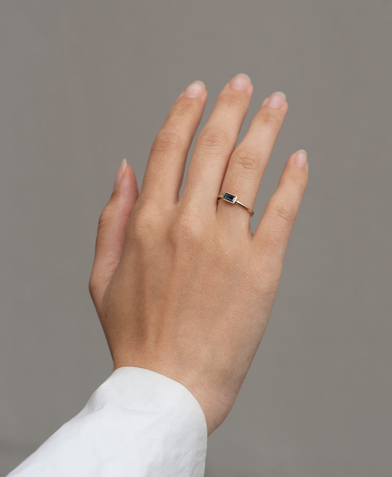 Mon Petit Stacker Ring - 9k Yellow Gold, Baguette Cut Blue Sapphire