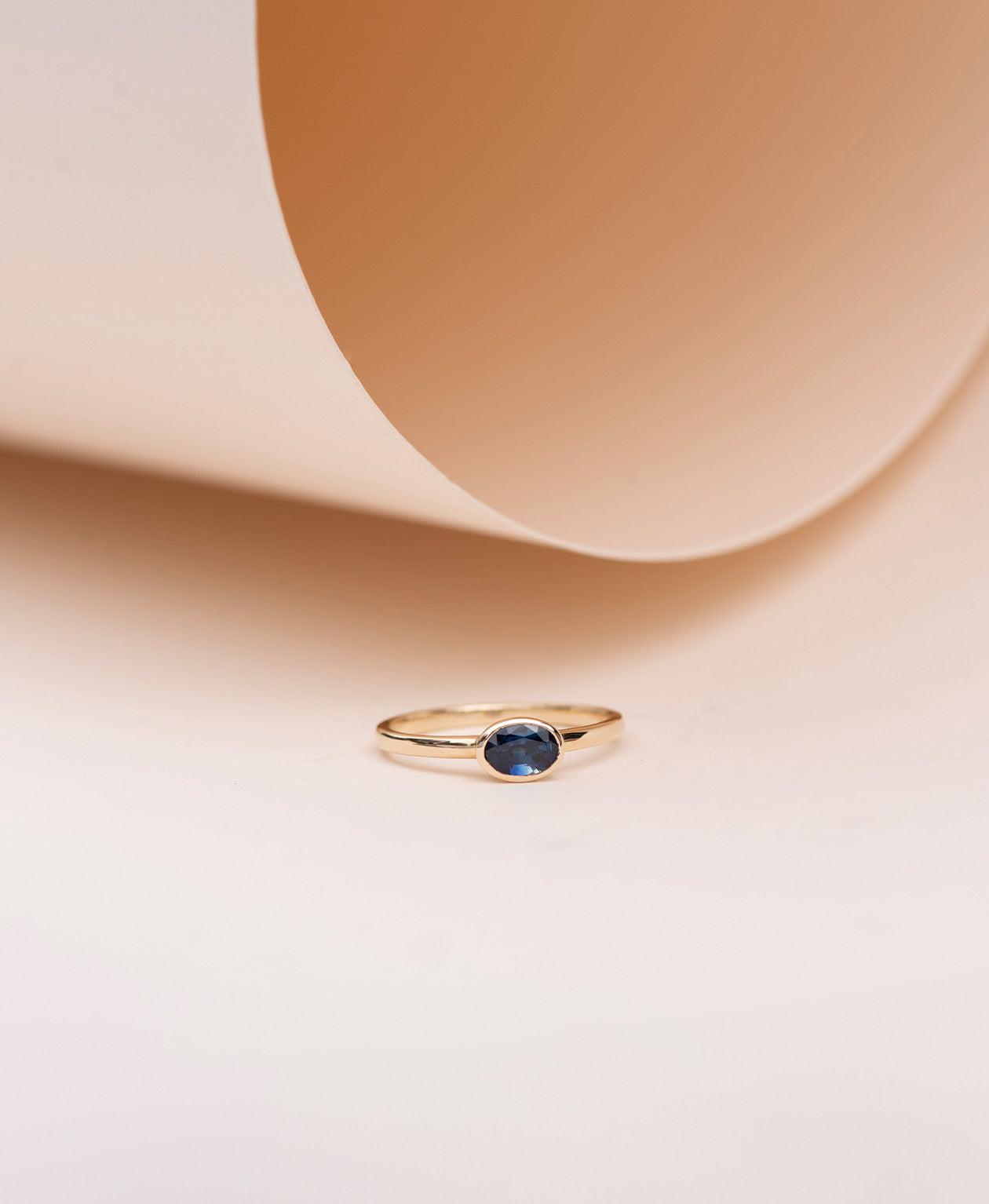 Mon Petit Stacker Ring - 9k Yellow Gold, Oval Cut Blue Sapphire